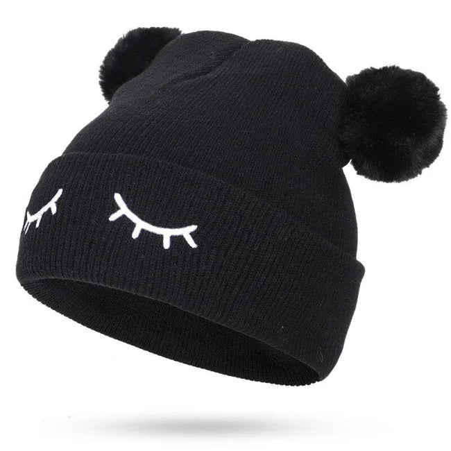 BONNET POMPON YEUX FERMÉS